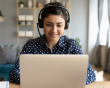 Researcher joins a webinar wearing a headset with microphone
