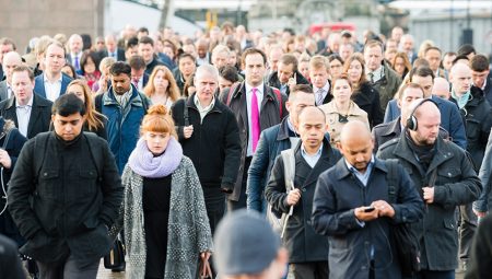 Commuters walking down the street